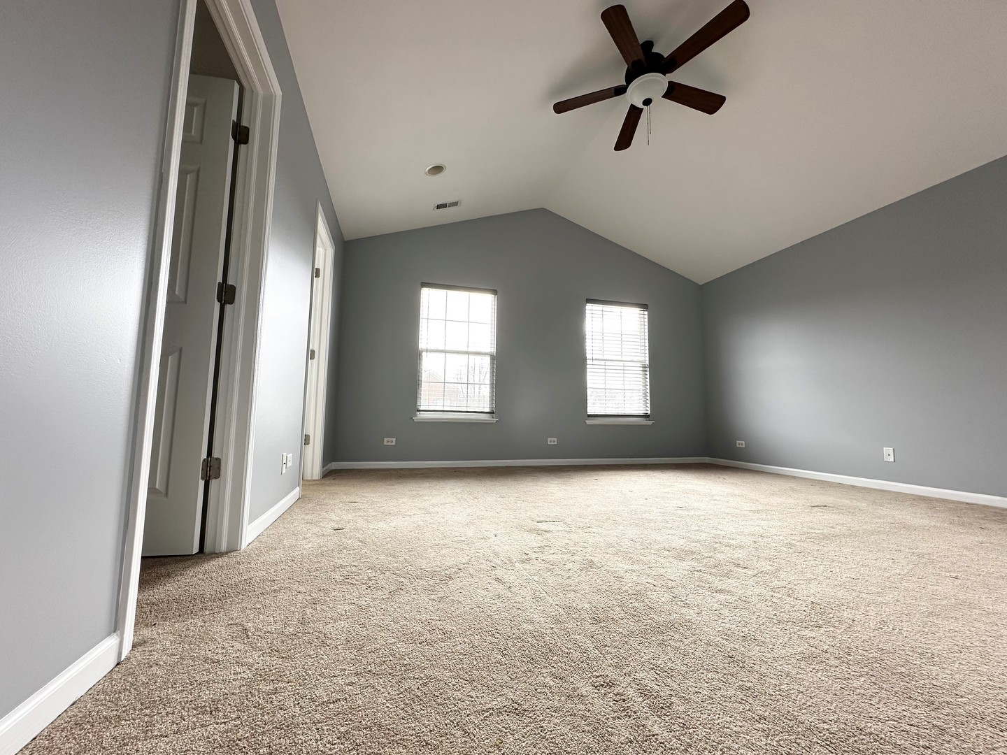 4110 Bethlehem Road Aurora, IL 60504 - Photo 31 of 53 an empty room with windows and fan