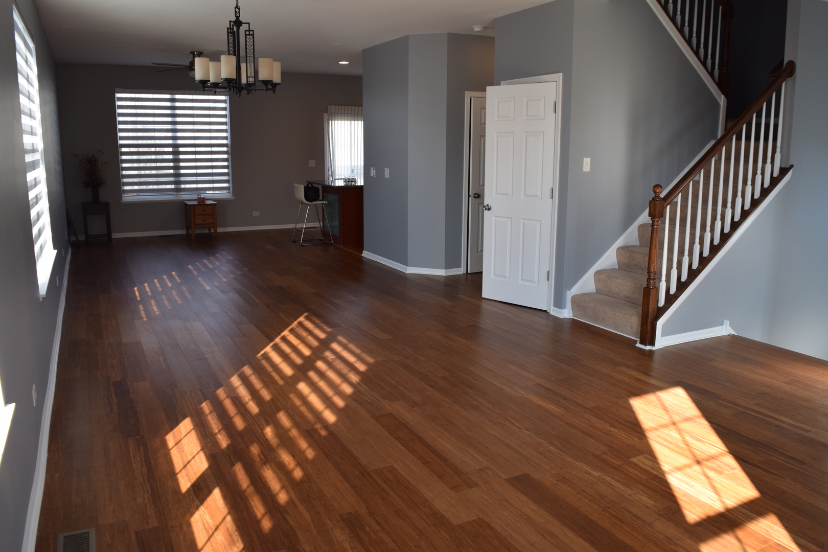 4110 Bethlehem Road Aurora, IL 60504 - Photo 8 of 53 wooden floor in an empty room with a window