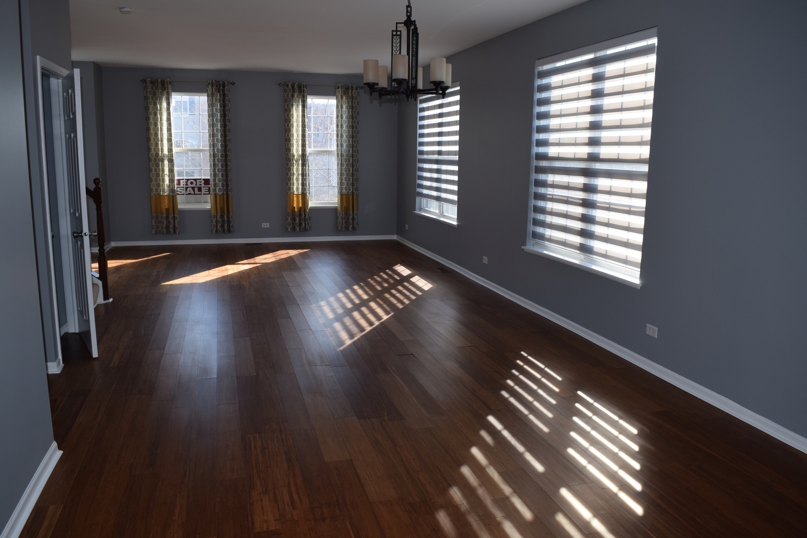 4110 Bethlehem Road Aurora, IL 60504 - Photo 10 of 53 a view of an empty room with wooden floor and a window