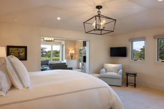 a bedroom with a bed and a walk in closet