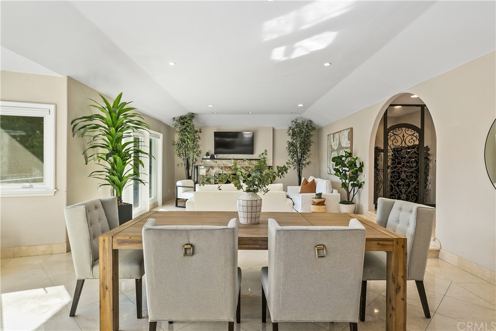 10282 Ambervale Lane North Tustin, CA 92705 - Photo 13 of 50 a view of a dining room with furniture and a potted plant