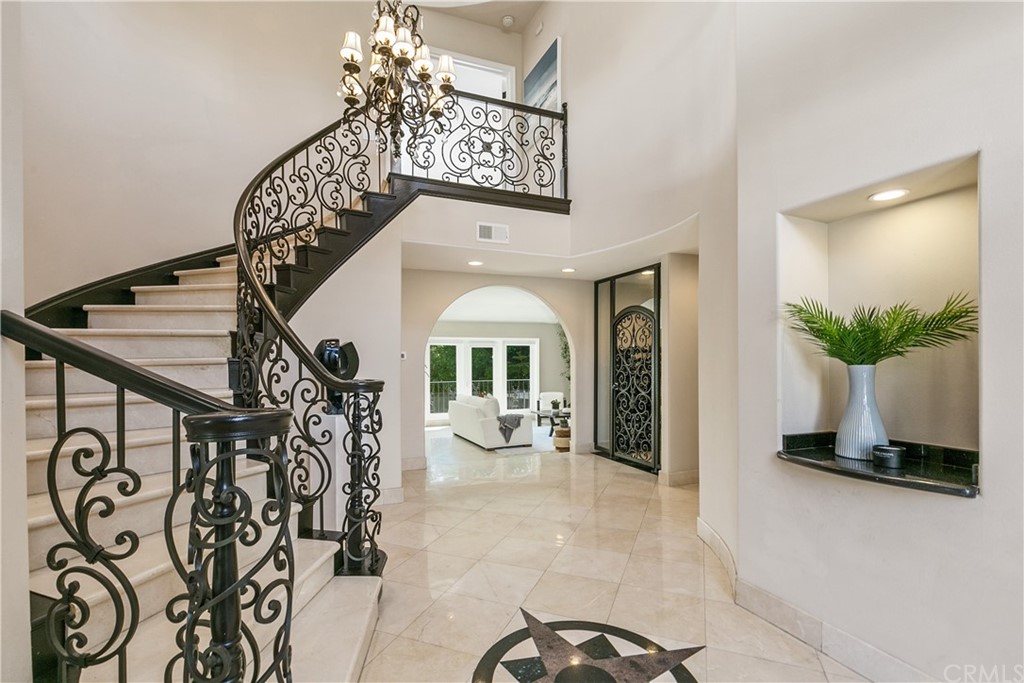 10282 Ambervale Lane North Tustin, CA 92705 - Photo 19 of 50 a view of a hallway with a flower pot