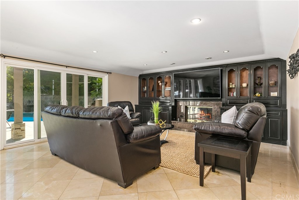 10282 Ambervale Lane North Tustin, CA 92705 - Photo 30 of 50 a living room with furniture and a large window