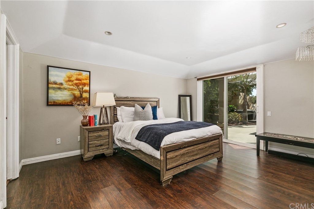 10282 Ambervale Lane North Tustin, CA 92705 - Photo 33 of 50 a bedroom with a bed and a large window