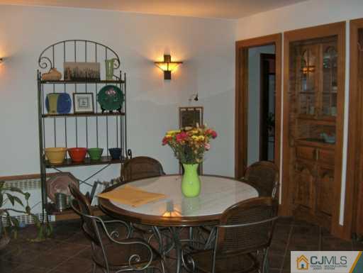 1049 Canal Road Princeton, NJ 08540 - Photo 2 of 6 a view of a dining room with furniture and wooden floor