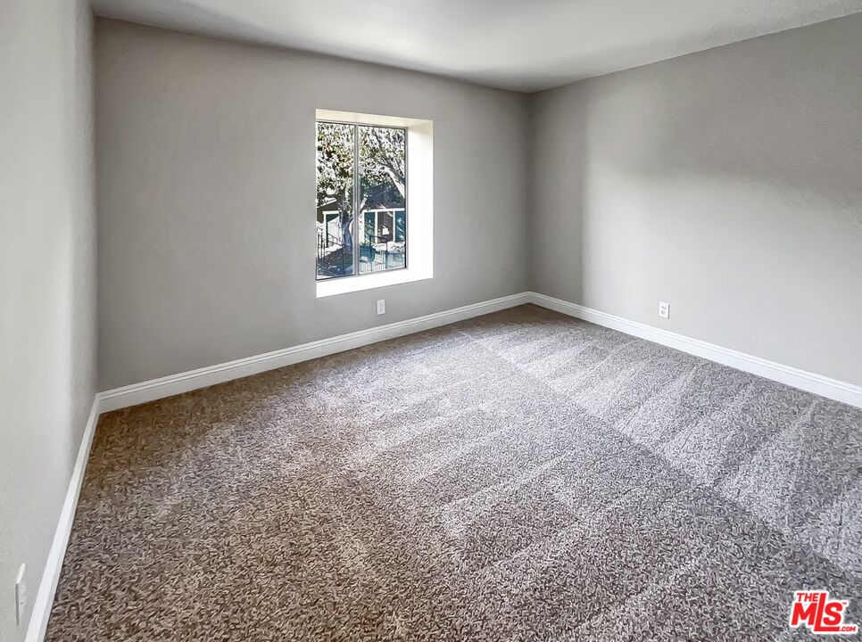 234 Springview Irvine, CA 92620 - Photo 15 of 19 an empty room with windows