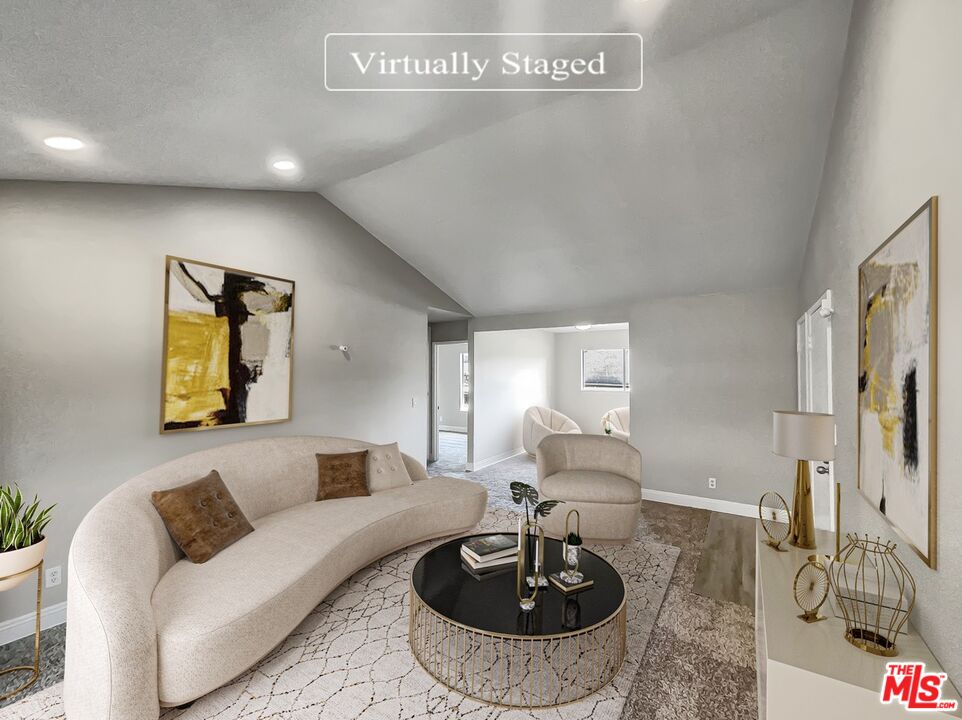 234 Springview Irvine, CA 92620 - Photo 2 of 19 a living room with furniture and a wooden floor