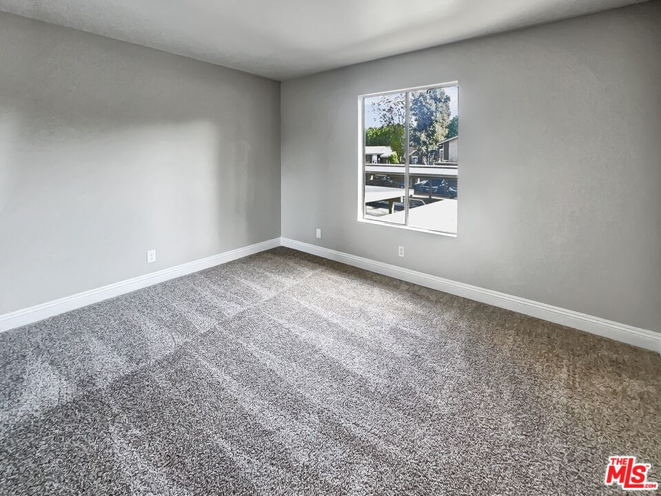234 Springview Irvine, CA 92620 - Photo 5 of 19 an empty room with windows