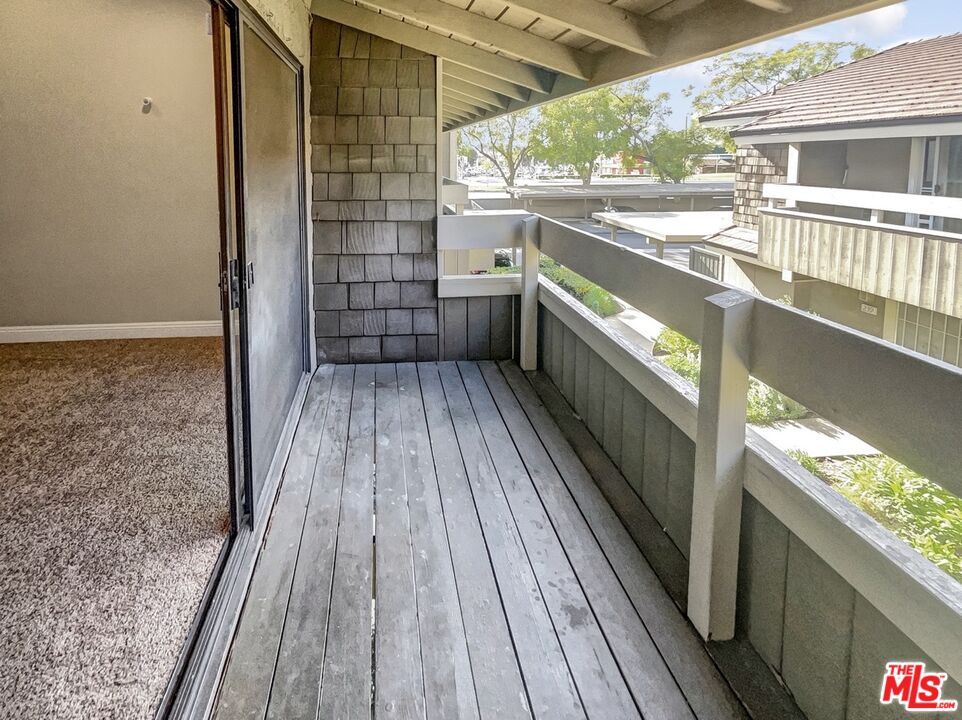 234 Springview Irvine, CA 92620 - Photo 9 of 19 a view of a balcony with wooden floor
