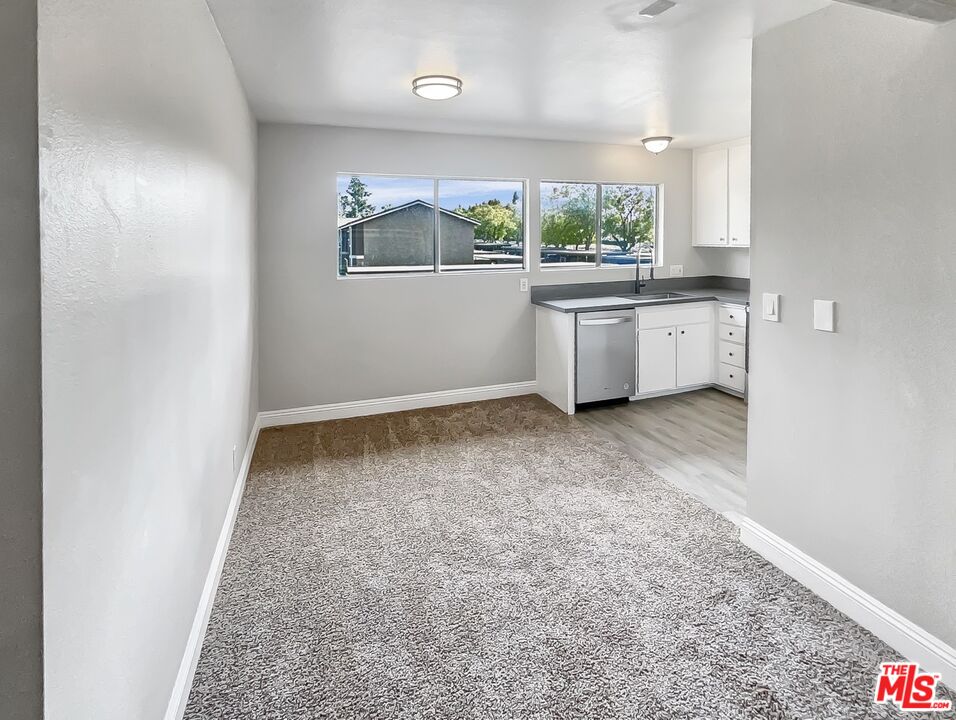 234 Springview Irvine, CA 92620 - Photo 10 of 19 a view of a kitchen with a sink and window
