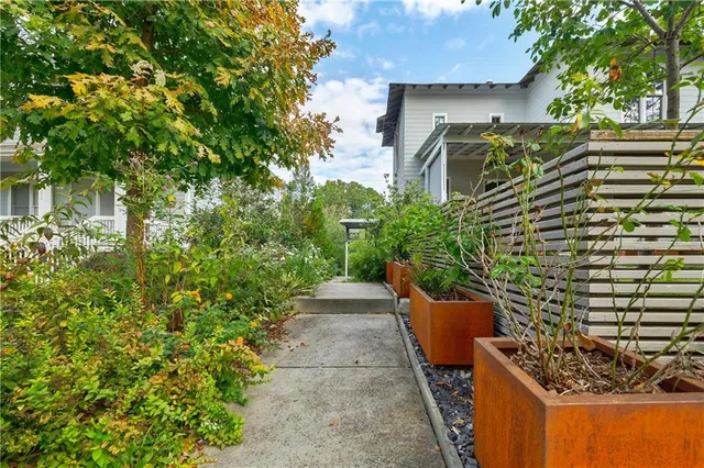 a backyard of a house with lots of green space