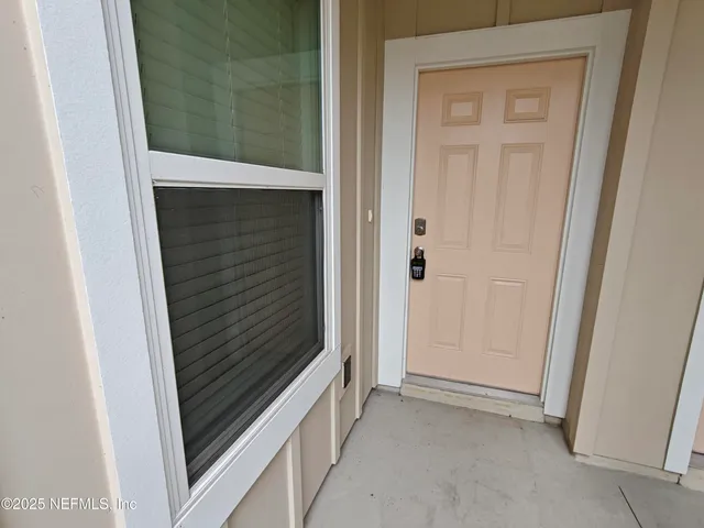 a kitchen with stainless steel appliances a sink a refrigerator and a stove