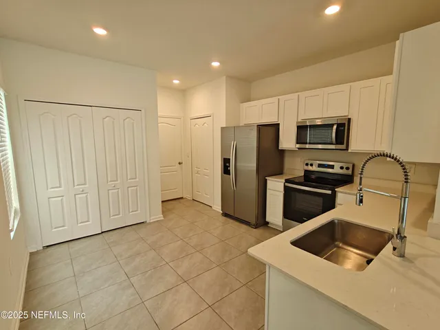 a bathroom with a toilet and a sink