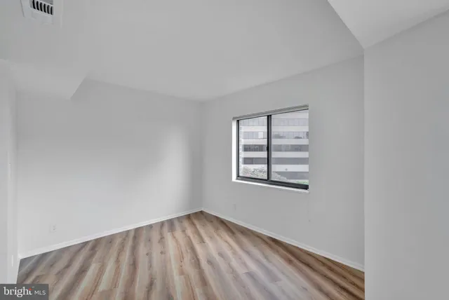 a bathroom with a bathtub and a toilet