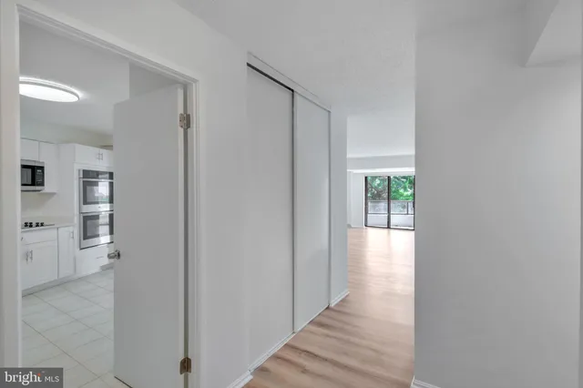 a backyard of a house with lots of green space and garden view