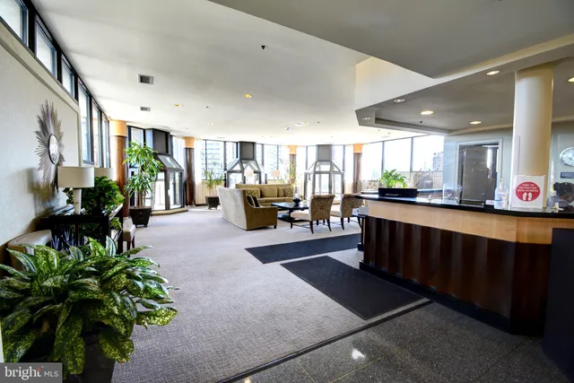 a room with gym equipment and a flat screen tv