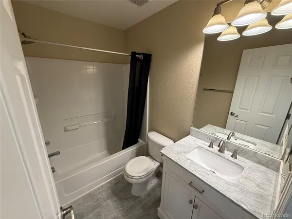 a view of a hallway with entryway