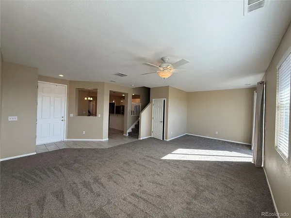 a view of an empty room with window