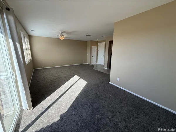 an entryway in a hallway with a window