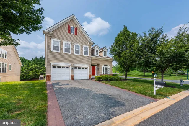 a front view of a house with a porch