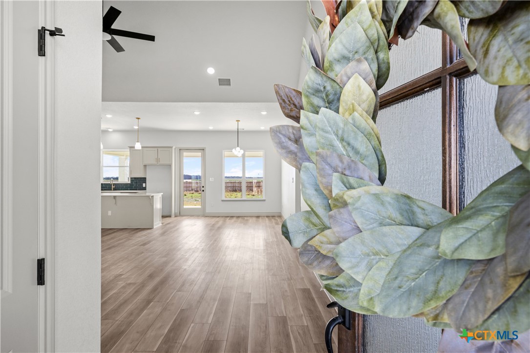 1835 Ember Drive Temple, TX 76502 - Photo 2 of 44 a living room with furniture and a wooden floor