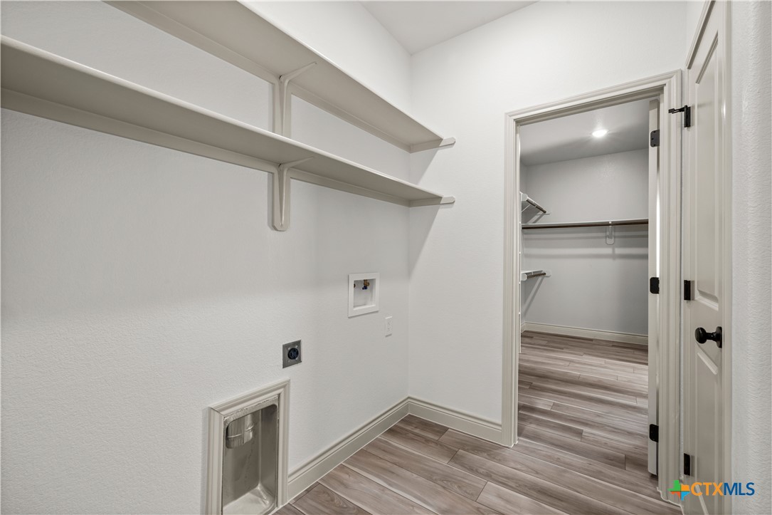 1835 Ember Drive Temple, TX 76502 - Photo 23 of 44 a view of an empty walk in closet