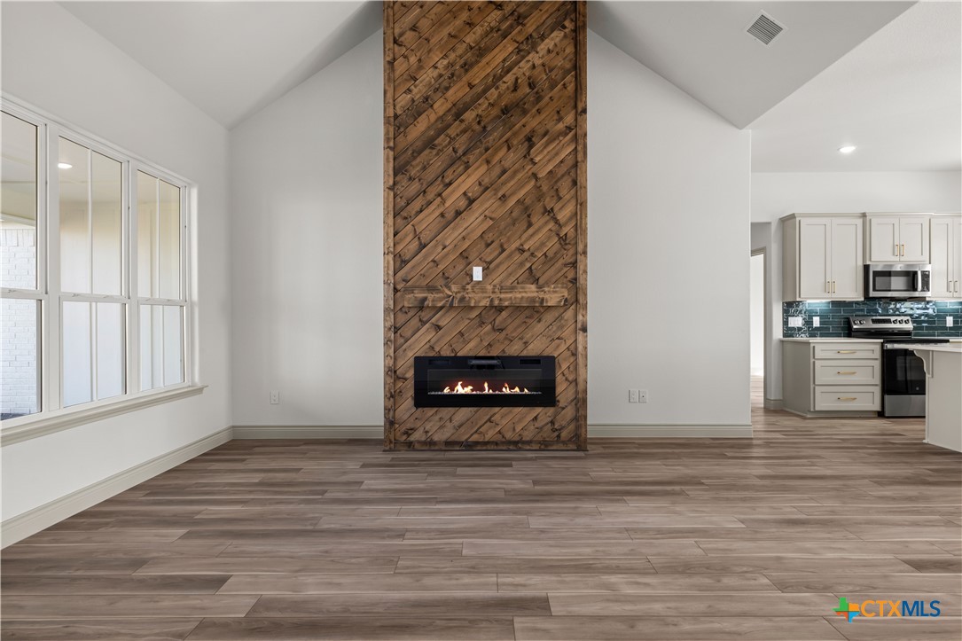 1835 Ember Drive Temple, TX 76502 - Photo 3 of 44 a view of a kitchen cabinets and wooden floor