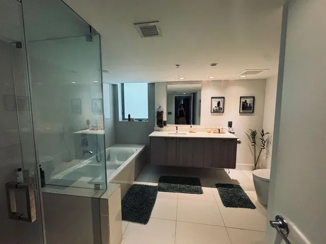 a living room with a couch and a view of living room