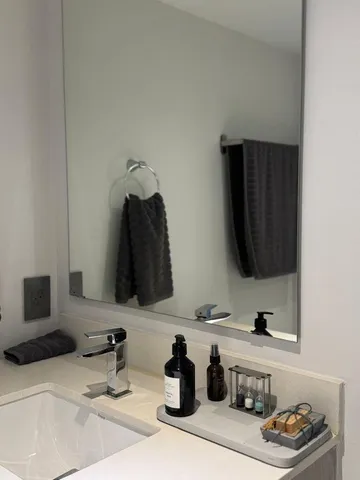 a view of gallery with painting on the wall and wall paintings