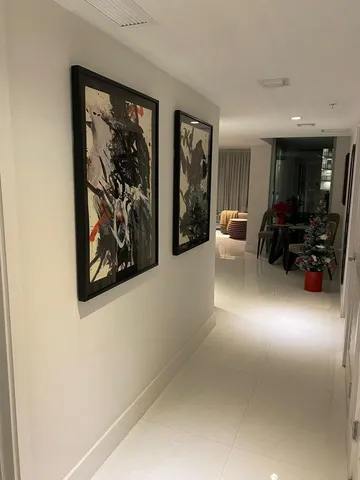a view of a balcony dining table and chairs