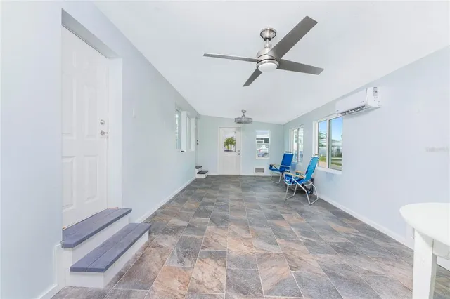 a bathroom with a sink and vanity