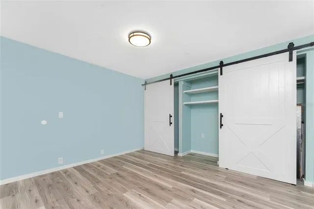 a view of a swimming pool with an outdoor seating