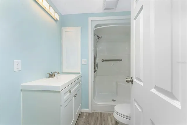 a view of a patio with a table chairs and a patio