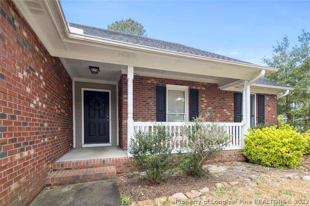 114 Windsor Lane Raeford, NC 28376 - Photo 2 of 32 a front view of a house with garden