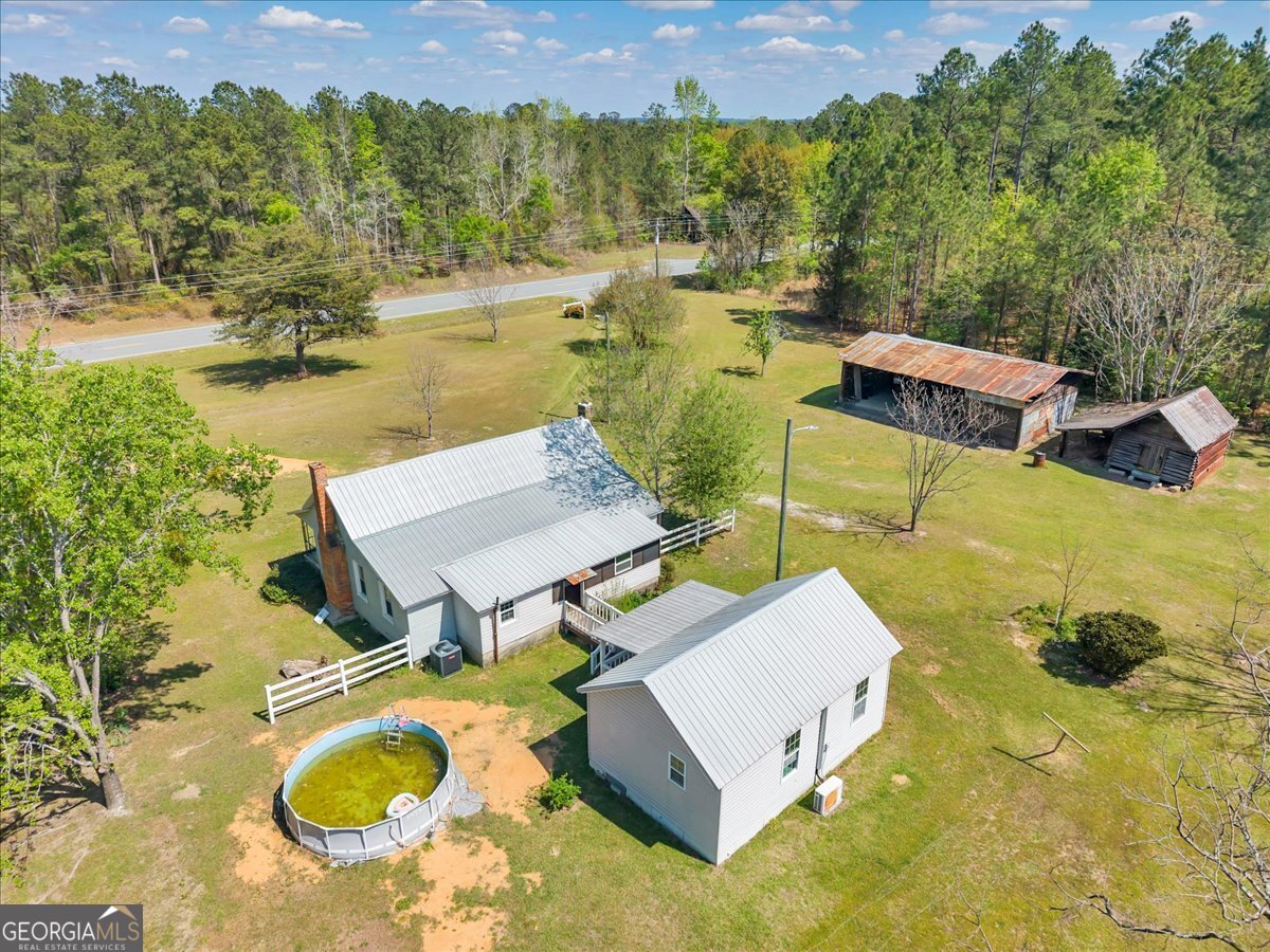 3613 S Highway Dublin, GA 31021 - Photo 44 of 52 an aerial view of residential houses with outdoor space