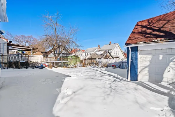 a view of a street with a building in the background