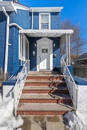 a view of a building with stairs and wooden floor