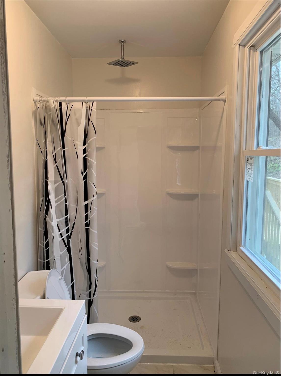 604 Basket Road Long Eddy, NY 12760 - Photo 37 of 37 a bathroom with a shower and a sink