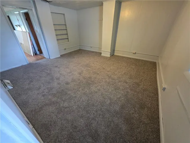 a view of room with front door