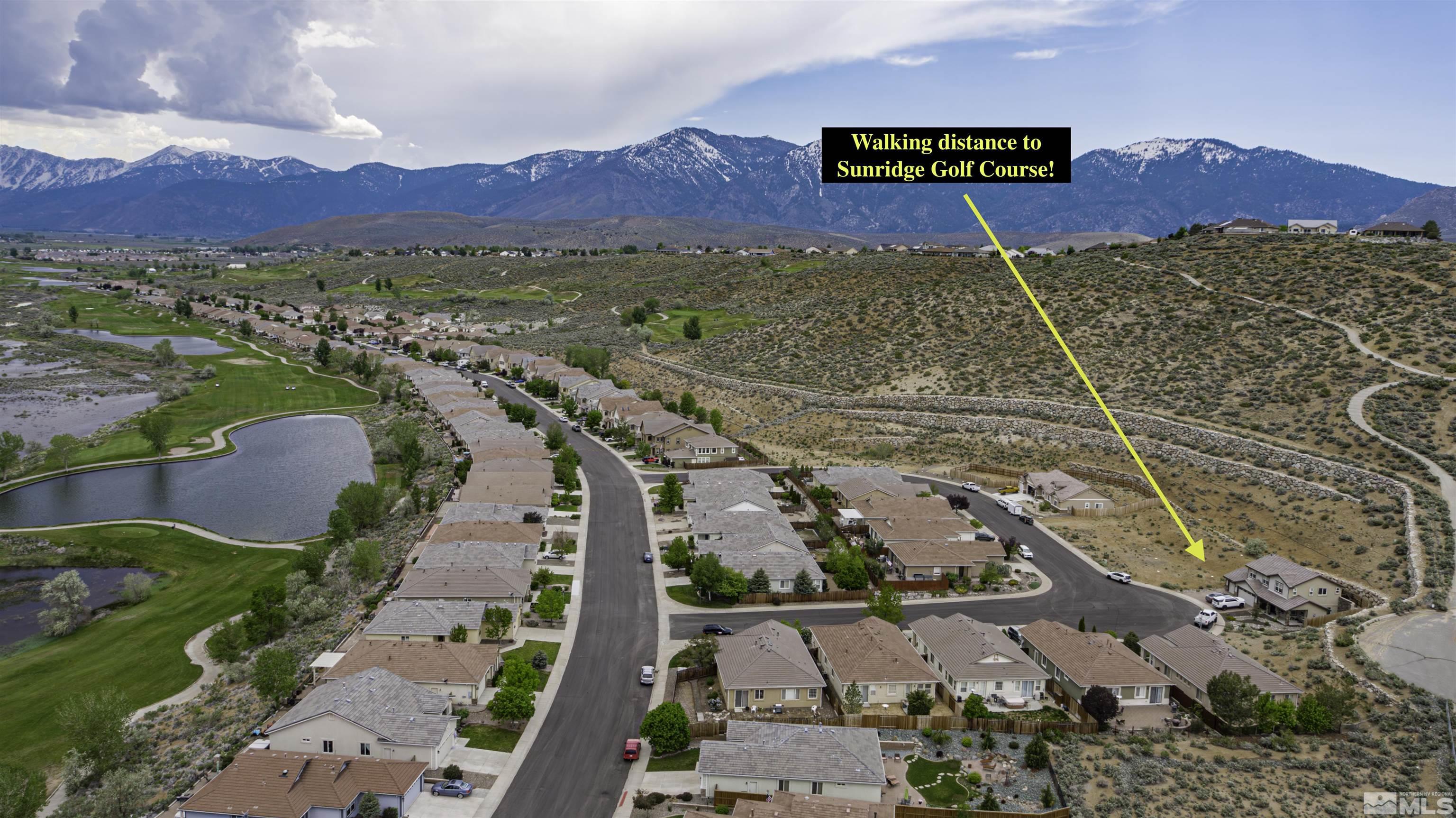 1086 Tee Drive Carson City, NV 89705 - Photo 3 of 12 a view of a street with a ocean view