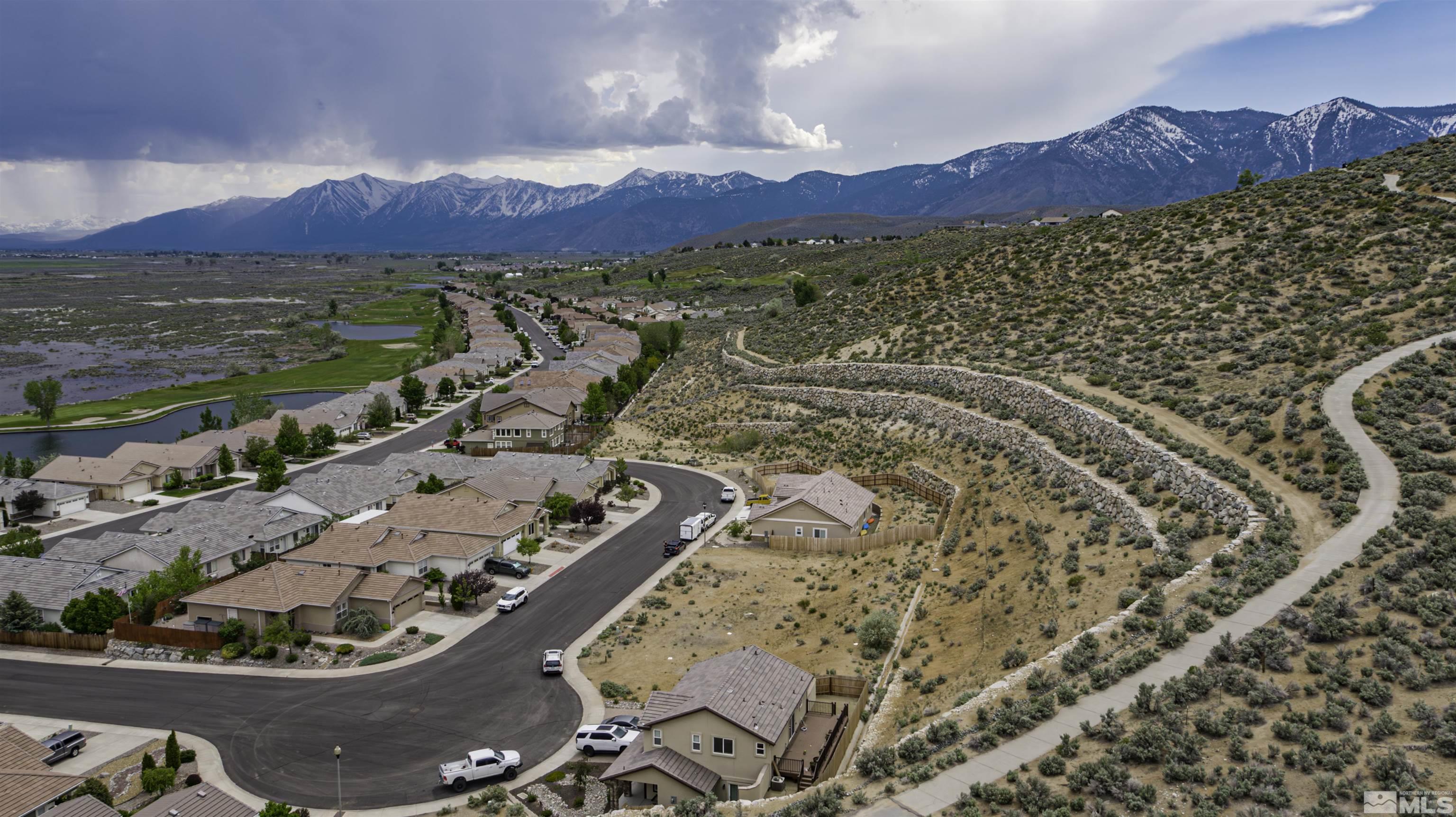 1086 Tee Drive Carson City, NV 89705 - Photo 7 of 12 a view of a city with a mountain