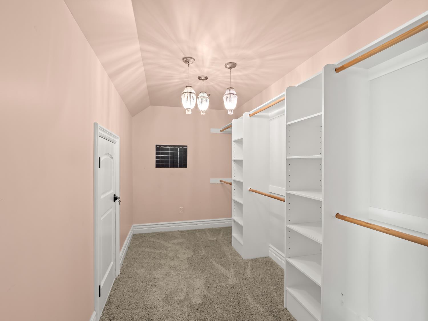 17113 Mark Road Madera, CA 93636 - Photo 48 of 99 a view of a hallway with a chandelier