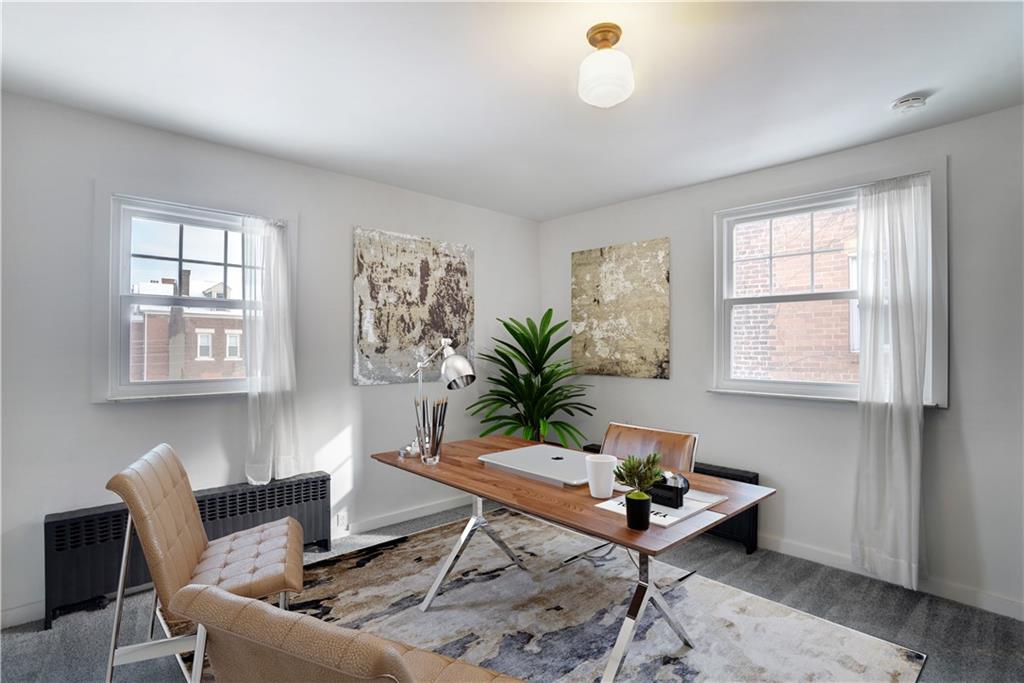 315 Main Street Pittsburgh, PA 15201 - Photo 18 of 23 a living room with furniture and a potted plant