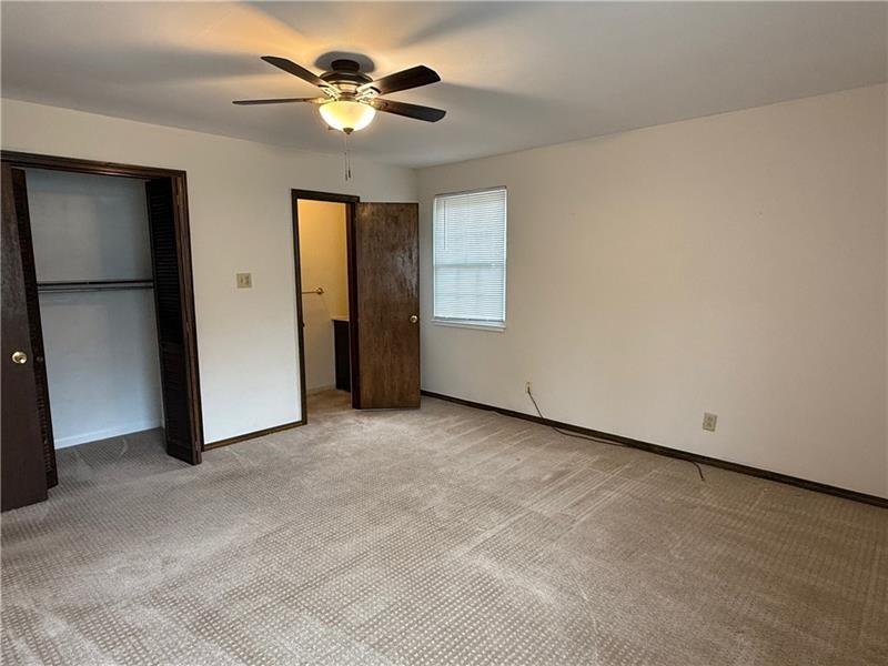3922 Anderson Road Gibsonia, PA 15044 - Photo 13 of 23 a view of an empty room with a ceiling fan