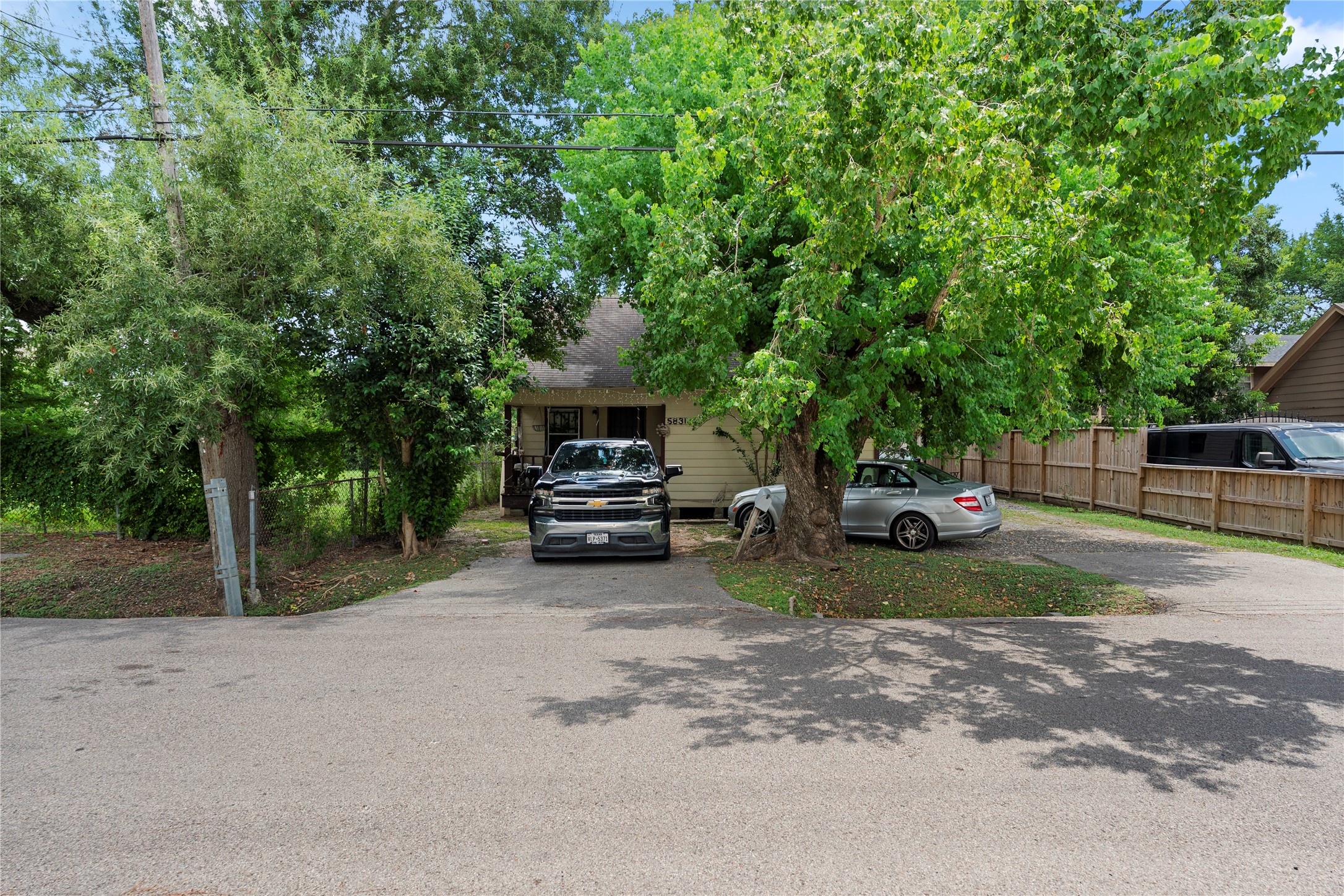 5831 Grace Lane Houston, TX 77021 - Photo 2 of 6 a view of a house with backyard and tree
