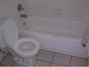 2536 Friday Cocoa, FL 32926 - Photo 6 of 12 a bathroom with a toilet and a washing machine