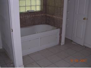 2536 Friday Cocoa, FL 32926 - Photo 9 of 12 a bathroom with a bathtub