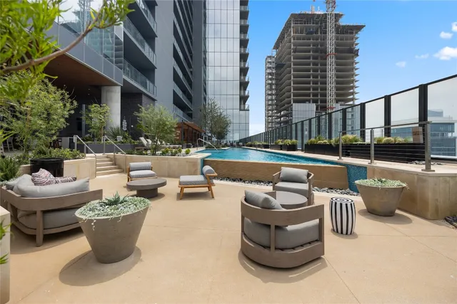 a outdoor living space with furniture and a potted plant