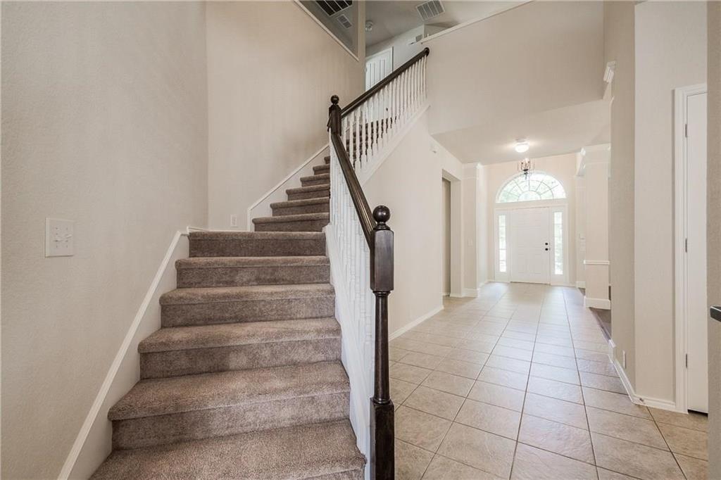 2338 Falcon Point Drive Frisco, TX 75033 - Photo 13 of 17 beautiful stairs to 2nd floor