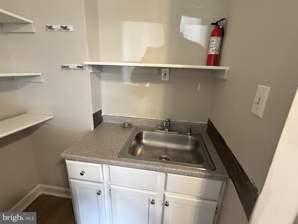 402 North Springfield Road Clifton Heights, PA 19018 - Photo 6 of 11 Compact utility space with modern sink.